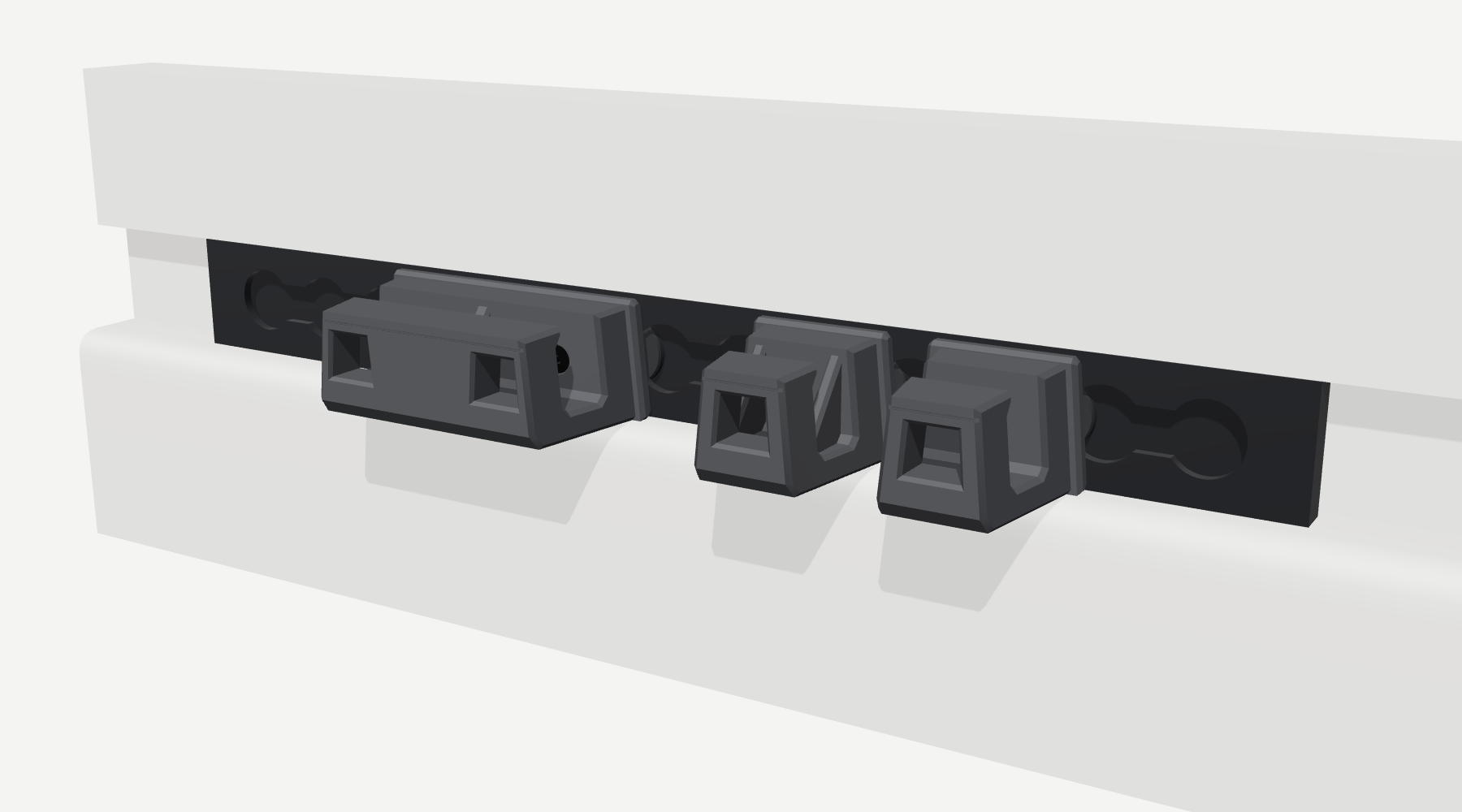 A set of hooks on the L-track